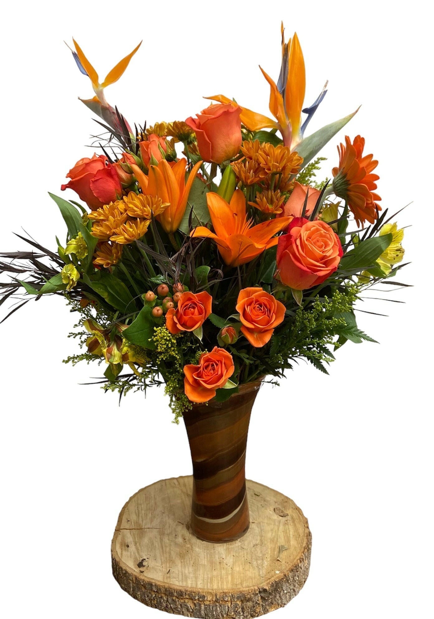 Bouquet of orange flowers in a striped vase on a wooden base with a white background