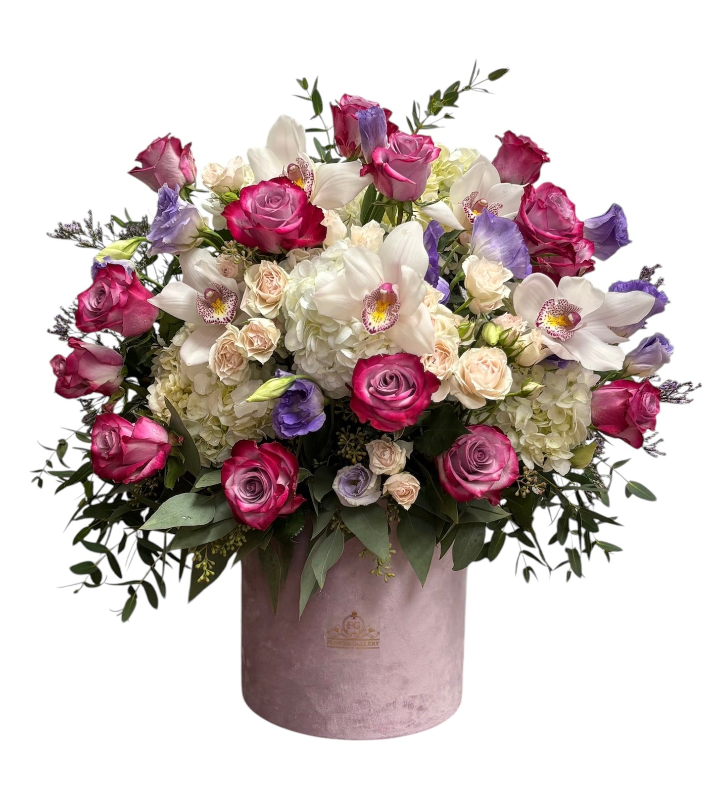 Bouquet of flowers in a pink valvet container on a white background