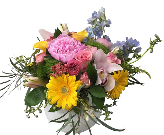 Colorful flower bouquet with pink, yellow, and green flowers on a white background