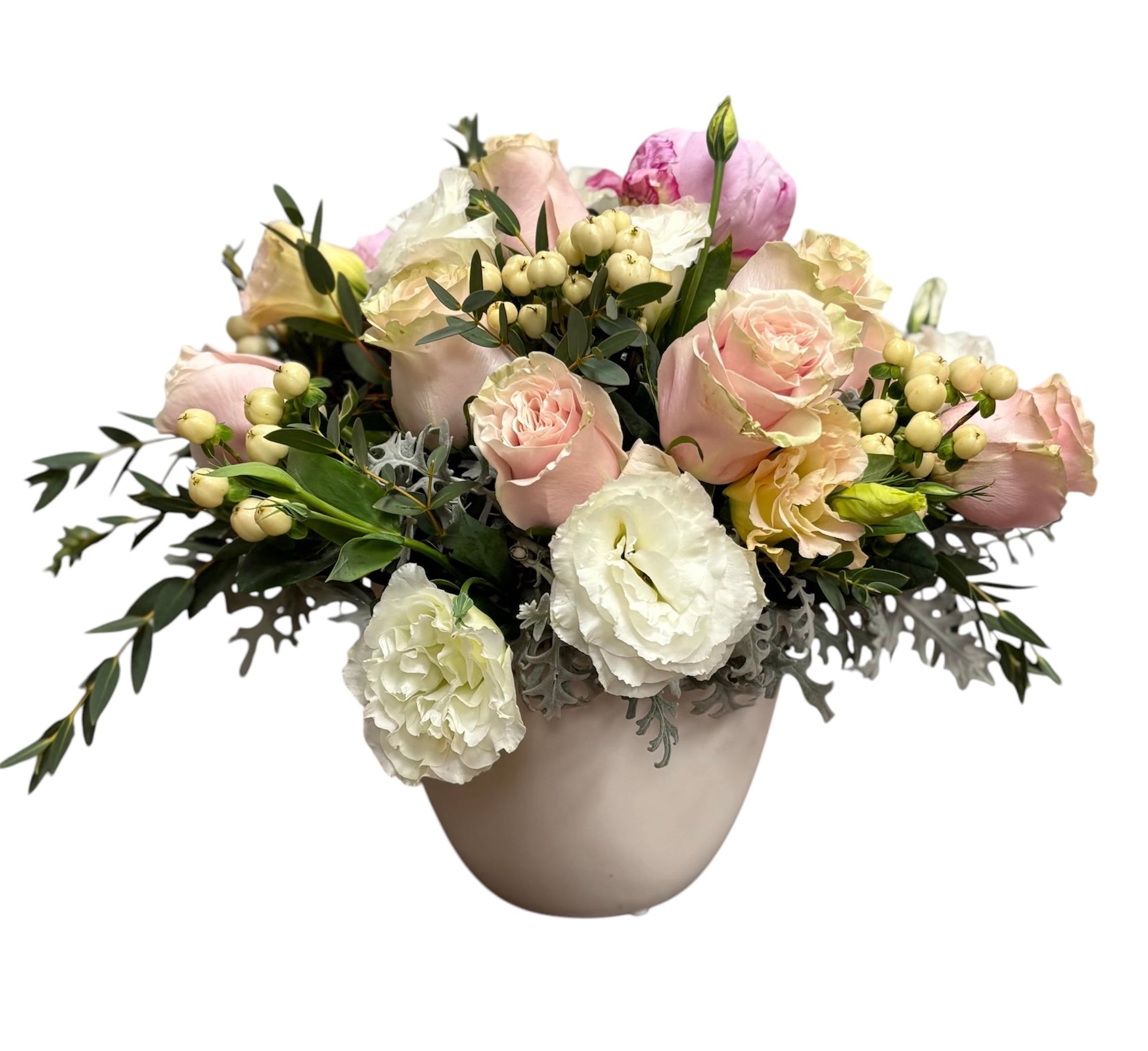 Bouquet of flowers in a vase on a white background