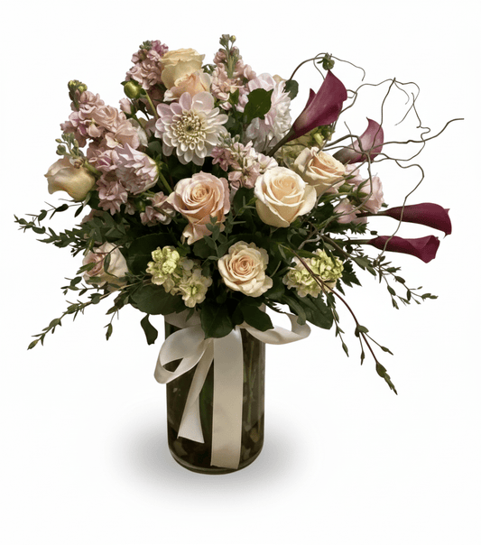 Bouquet of flowers in a clear vase.