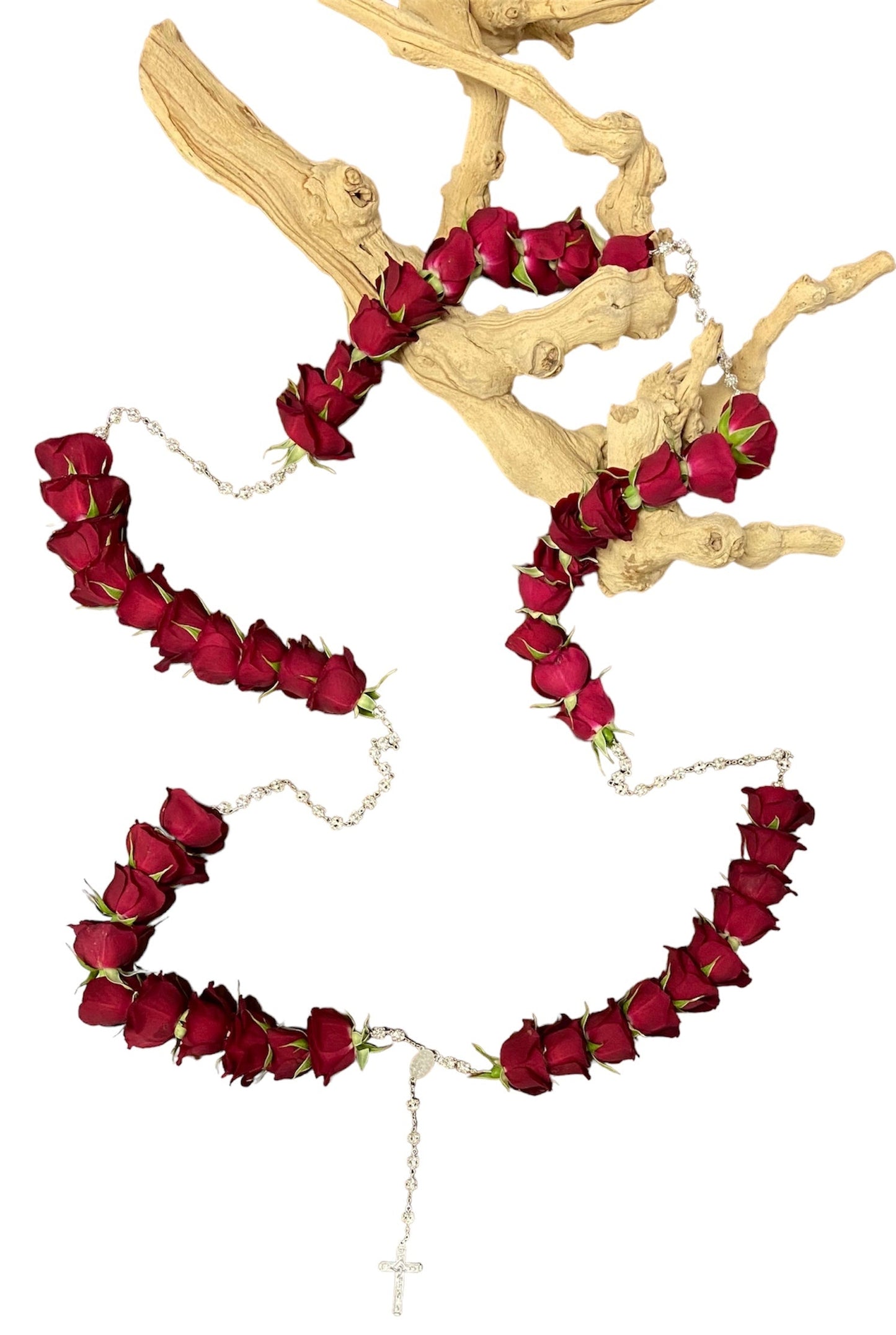 Rosary Bead with red rose garland on a white background with a branch