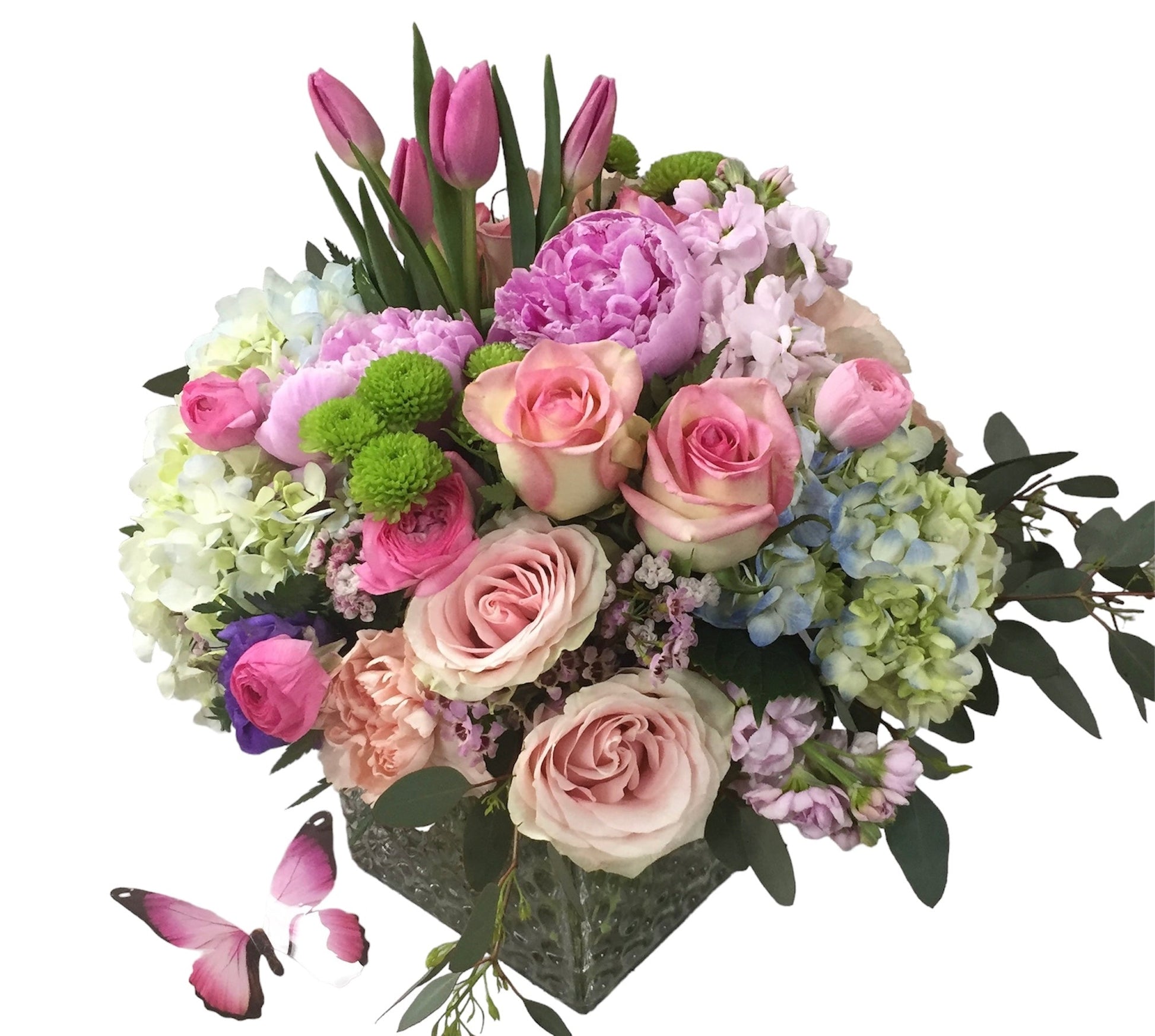 Colorful flower arrangement with pink, purple, and green flowers on a white background