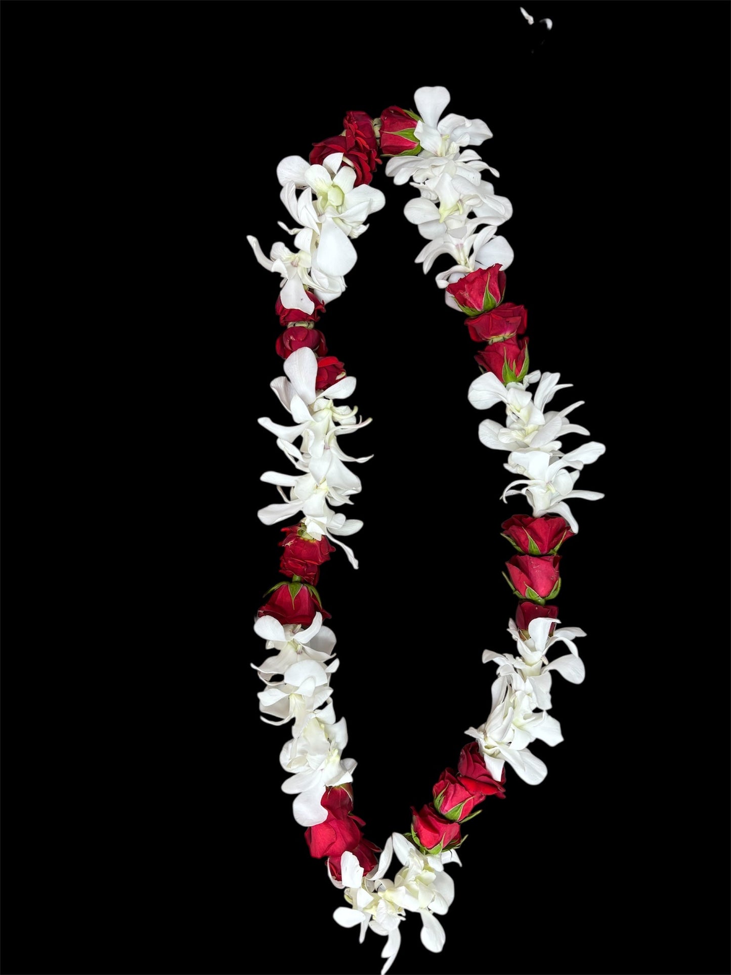 White & Orange/Red Lei.